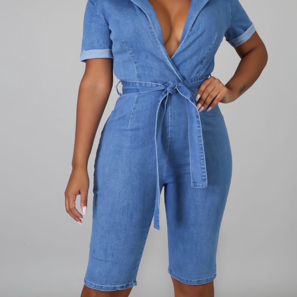 Denim blue comfy romper. New and concealed in bag